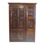 A late 17th century and later oak cupboard,