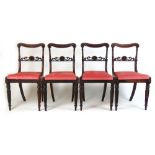 A set of four William IV rosewood dining chairs,