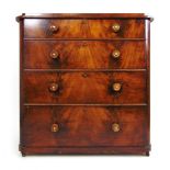 A 19th century mahogany chest of four long graduated drawers,