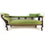 A late Victorian mahogany chaise longue upholstered in a cut green fabric,