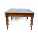 A 19th century mahogany extending dining table with three leaf's on a pull out mechanism,