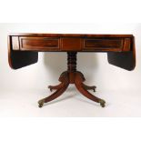 An early 19th century rosewood and brass inlaid sofa table,