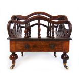 A late Victorian figured walnut canterbury,