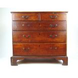 An 18th century and later oak chest of two short over three long drawers on bracket feet, h.