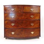 An early 19th century mahogany bow front chest of two short over three long drawers, h. 95 cm, w.