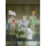 A collection of three Royal Worcester figures of children CONDITION REPORT: No
