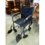 A black tubular wheel chair