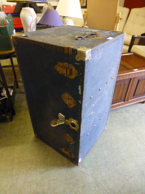 A blue and metal bound travelling case