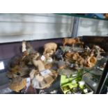 A collection of Aynsley moulded animals to include highland cattle pigs, cats etc.