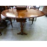 A 19th century walnut oval topped Sutherland table with single drawer to end