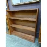 A mid 20th century teak open bookcase