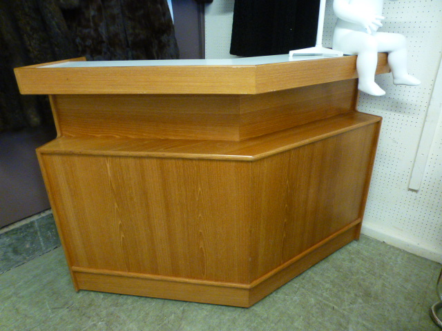 A mid 20th century teak bar