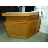 A mid 20th century teak bar