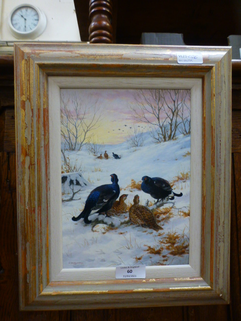 A framed oil on board of game birds signed bottom left G.