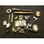 An assortment of silver and white metal costume jewellery, pens etc.