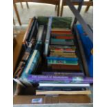 A tray of assorted hardback books of various subjects