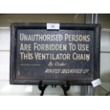 An early 20th century wooden plaque 'Unauthorized persons are forbidden to use this ventilator
