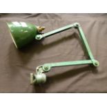 An early 20th century green angle poise industrial work light