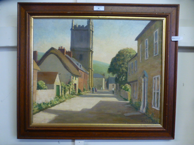 A framed oil on canvas of village street scene, signed R.