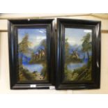 A pair of ebonised framed paintings on glass of windmill and castle scenes