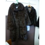 A brown fur coat by Hilda Kirk,