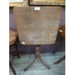 A 19th century mahogany tilt top table