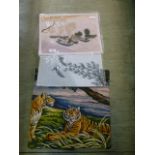 Two hand embroidered scenes of boats together with a tapestry of tiger in jungle