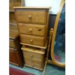 A pair of modern pine three drawer chests