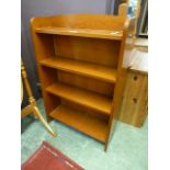 A stained pine bookcase