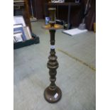 A large brass church candlestick