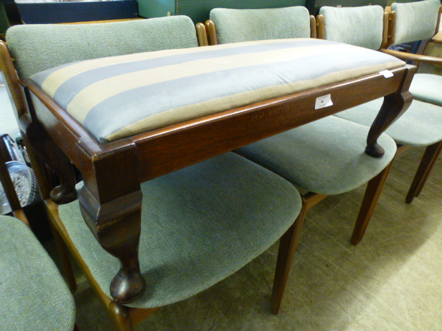A reproduction foot stool with striped silk upholstery on cabriole legs CONDITION REPORT: