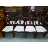 A set of six standard and two carver early 20th century reproduction mahogany dinning chairs