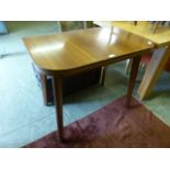 A mid-20th century fold over tea table