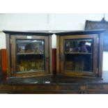 A pair of Edwardian rosewood cabinets with bevel glass doors A/F (Part of something larger)