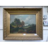 An ornate gilt framed oil on canvas of cottage in countryside scene signed bottom left