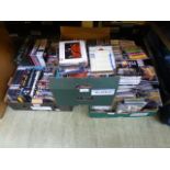 Three trays containing CDs and DVDs