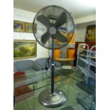 A modern fan on stand