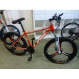 An unused Extreme XRMI Navajo bike in red CONDITION REPORT: Bike may required