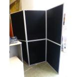 A black three fold screen