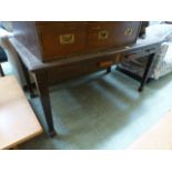 A late 19th mahogany desk having two drawers