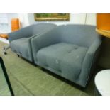 A pair of grey fabric upholstered easy chairs