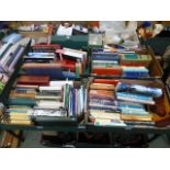 Four trays of assorted books to include John Fletcher, reference books etc.