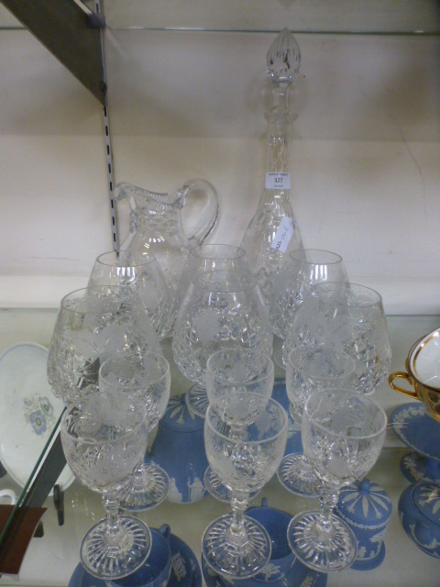 A selection of cut and etched glass ware, to include a decanter, jug,