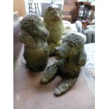 Three stoneware garden ornaments, one being of owl,