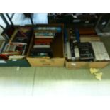 Three trays of assorted books by various authors