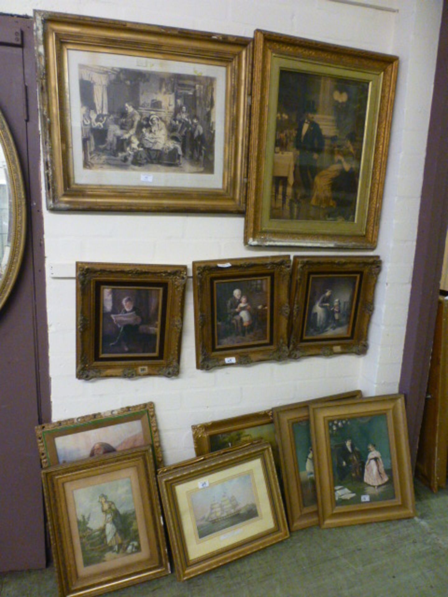 A selection of gilt framed prints of people, ships etc.