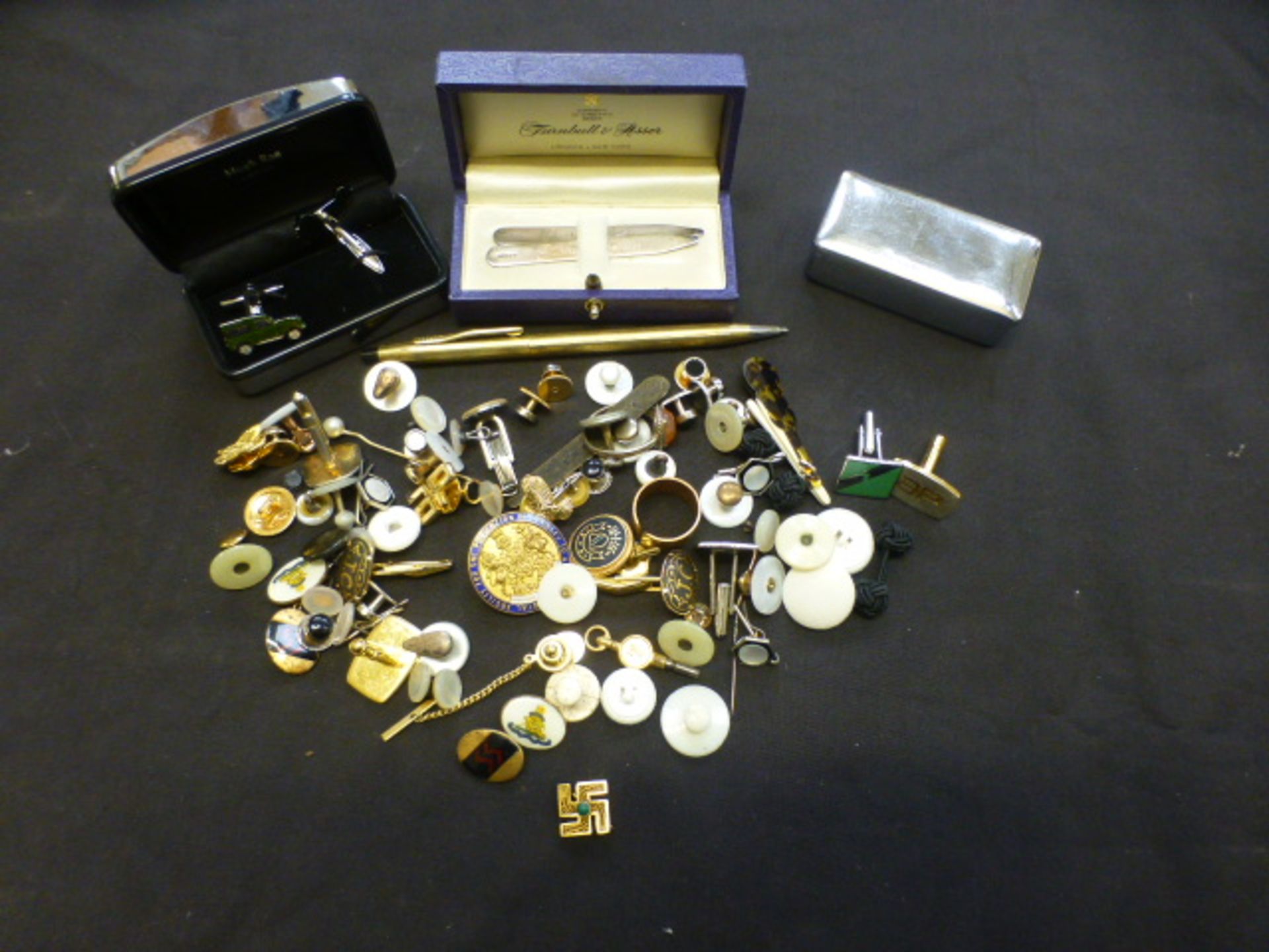 A bag containing assorted cufflink's, buttons, rings etc.