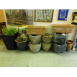 A selection of garden pots, to include terracotta,