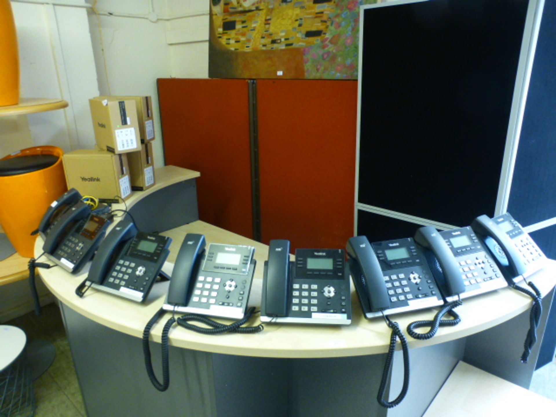 Twelve Yealink telephones