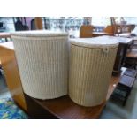 Two cream painted wicker linen baskets